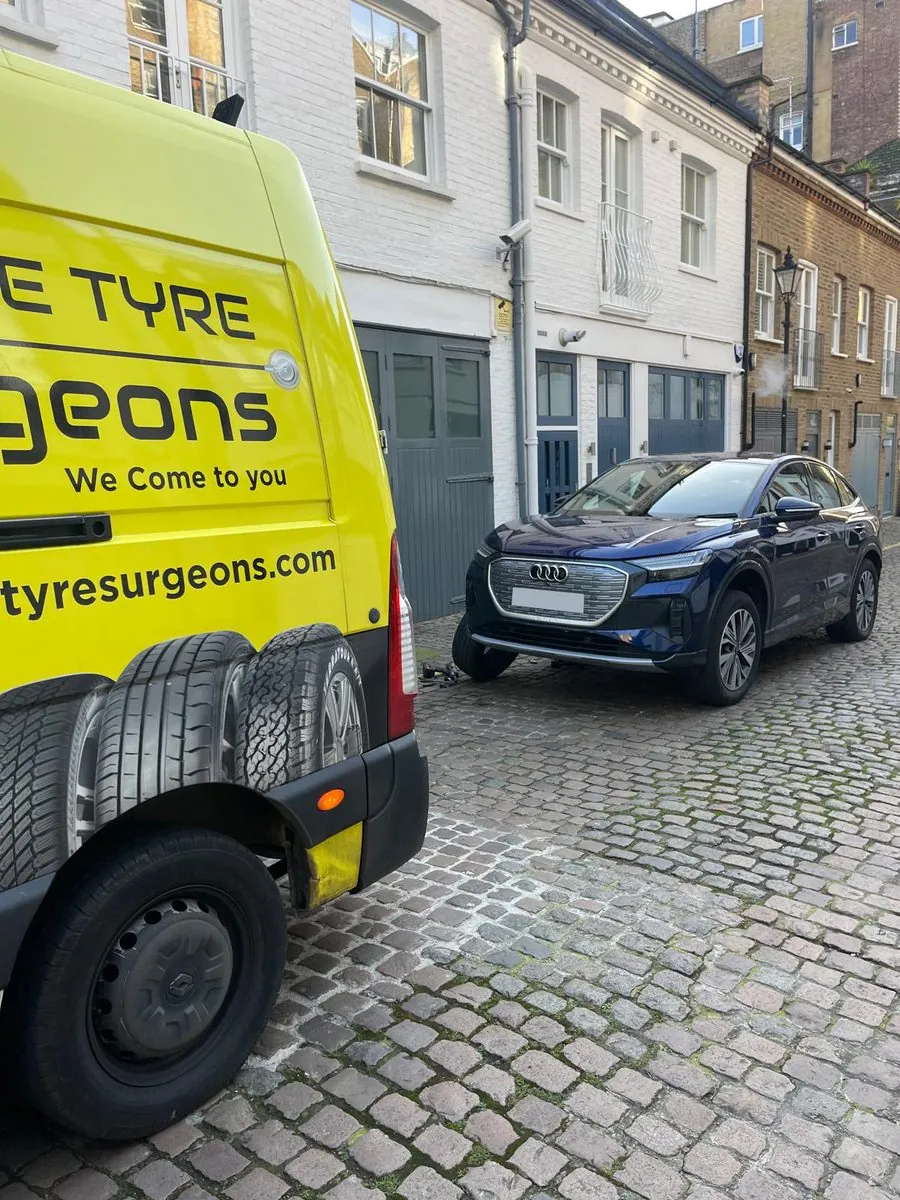 EV tyre replacement on a residential street