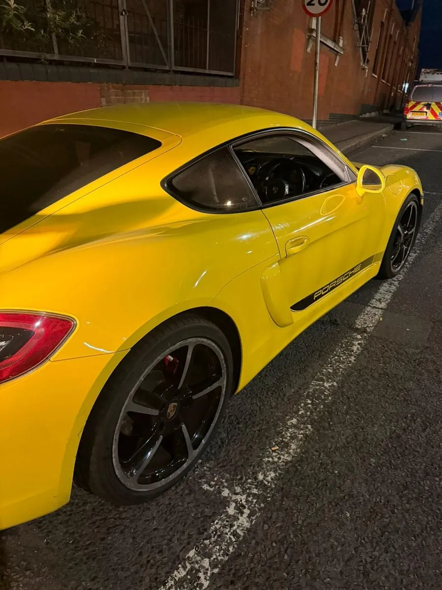 After dark, Cayman on the kerb
